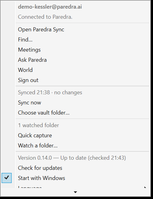 The tray context menu with sync, capture, update and startup controls, drawn by Windows in the system light theme